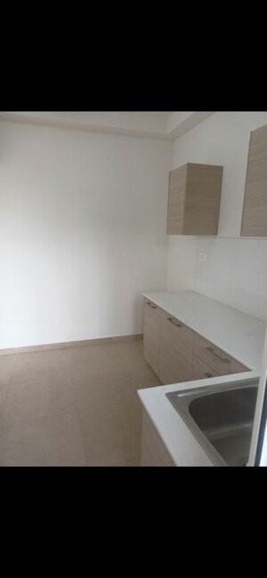 Kitchen in 2 BHK Apartment at Bhartiya City Nikoo Homes II, Thanisandra Main Road – for Rent