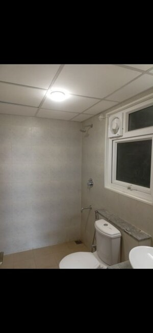 Bathroom in 2 BHK Apartment at Bhartiya City Nikoo Homes II, Thanisandra Main Road – for Rent