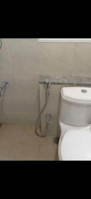 Bathroom in 2 BHK Apartment at Bhartiya City Nikoo Homes II, Thanisandra Main Road – for Rent