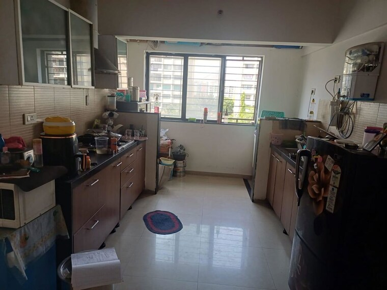 Kitchen, rainbow-revell-orchid 2 Bedroom 750 Sq.Ft. Apartment In Lohgaon Pune 10228309