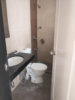 Bathroom in 2 BHK Apartment at Rama Celestial City Phase II, Ravet – for Rent