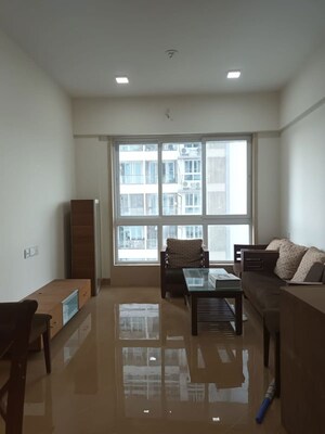 Living Room in 2 BHK Apartment at Upper East 97, Malad East – for Sale