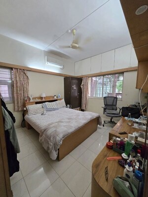 Bedroom in 2 BHK Apartment at Ranade Yashodhan, Mayur Colony – for Rent