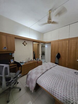 Bedroom in 2 BHK Apartment at Ranade Yashodhan, Mayur Colony – for Rent