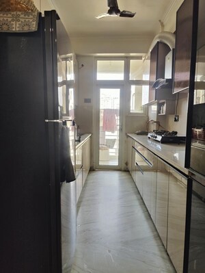 Kitchen in 2 BHK Apartment at Mahagun Mansion I and II, Vaibhav Khand – for Sale