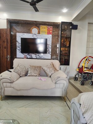 Living Room in 2 BHK Apartment at Mahagun Mansion I and II, Vaibhav Khand – for Sale