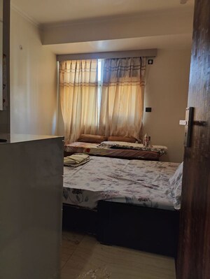 Bedroom in 2 BHK Apartment at Mahagun Mansion I and II, Vaibhav Khand – for Sale