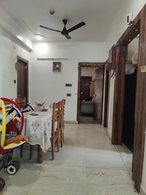 Living Room in 2 BHK Apartment at Mahagun Mansion I and II, Vaibhav Khand – for Sale