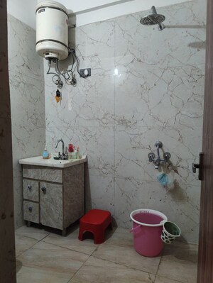 Bathroom in 2 BHK Apartment at Mahagun Mansion I and II, Vaibhav Khand – for Sale