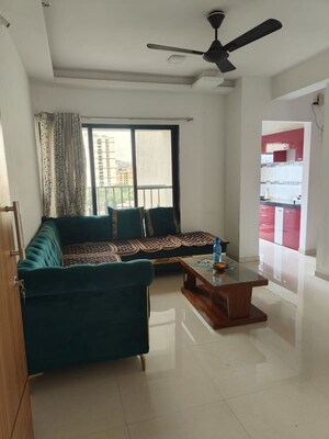 Living Room in 1 BHK Apartment at Dynamic Crest, Shilphata – for Rent