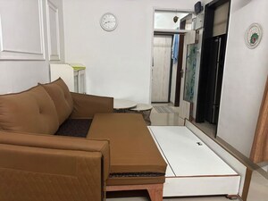 Living Room in 1 BHK Apartment at Hyde Park CHS, Kharghar – for Rent