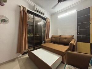 Living Room in 1 BHK Apartment at Hyde Park CHS, Kharghar – for Rent