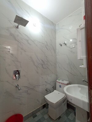 Bathroom in 3 BHK Builder Floor at Dwarka Mor – for Sale