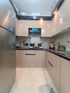 Kitchen in 3 BHK Builder Floor at Dwarka Mor – for Sale