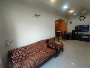Living Room in 2 BHK Apartment at Planet Powai CHS, Powai – for Rent
