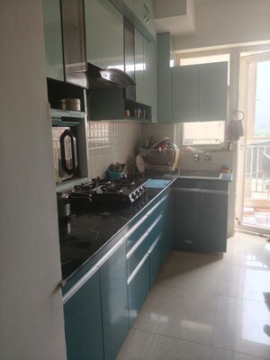 Kitchen in 2 BHK Apartment at Shree Vardhman Green Court, Sector 90 – for Rent