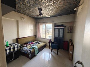 Bedroom in 2 BHK Apartment at Avni 2 CHS, Mohammadwadi – for Rent