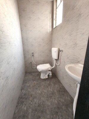 Bathroom in 2 BHK Apartment at Goel Ganga Millennia, Undri – for Rent