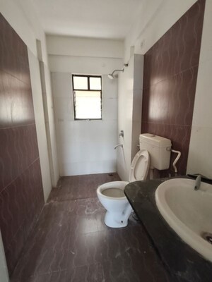 Bathroom in 2 BHK Apartment at Kolte Patil Margosa Heights, Mohammadwadi – for Rent