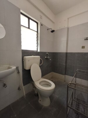Bathroom in 2 BHK Apartment at Kolte Patil Margosa Heights, Mohammadwadi – for Rent