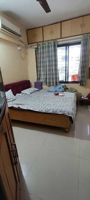 Bedroom in 2 BHK Apartment at Seawoods Sector 50 – for Rent