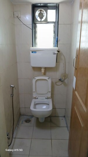 Bathroom in 1 BHK Apartment at Malad CHS, Malad East – for Rent