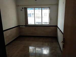 Room in 1 BHK Apartment at Dheeraj Uphar CHS. LTD., Malad East – for Sale