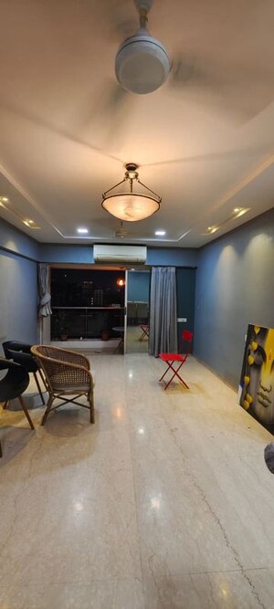 Living Room in 2 BHK Apartment at Parivar CHS Santacruz West, Santacruz West – for Rent