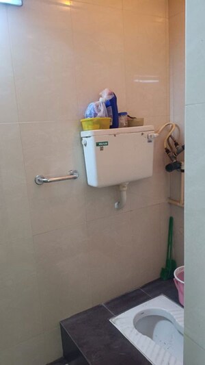 Bathroom in 2 BHK Apartment at New Mhada Towers, Andheri West – for Sale