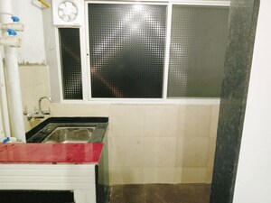 Kitchen in 2 BHK Apartment at Shubhankar Durvaa, Dhanori – for Rent