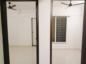 Room in 2 BHK Apartment at Shubhankar Durvaa, Dhanori – for Rent