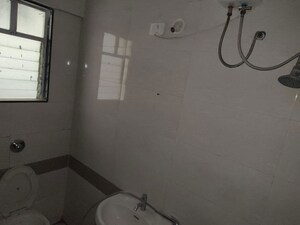 Bathroom in 2.5 BHK Apartment at Pimple Saudagar – for Rent
