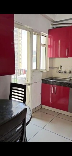 Kitchen in 2 BHK Apartment at Panchsheel Green Mart, Sector 16 Greater Noida – for Rent