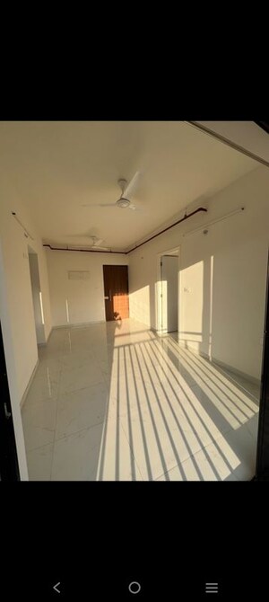 Building Lobby in 1.5 BHK Apartment at Runwal Gardens, Dombivli East – for Rent
