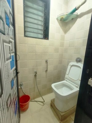 Bathroom in 3 BHK Apartment at Windsor Garden Enclave, Vasant Vihar – for Rent