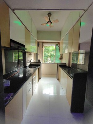 Kitchen in 2 BHK Apartment at Mohan Geenwoods, Badlapur West – for Rent