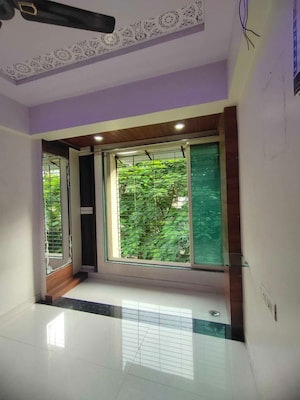 Room in 2 BHK Apartment at Mohan Geenwoods, Badlapur West – for Rent