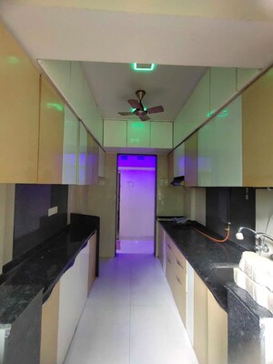 Kitchen in 2 BHK Apartment at Mohan Geenwoods, Badlapur West – for Rent