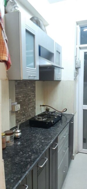 Kitchen in 3 BHK Apartment at Prateek Wisteria, Sector 77 – for Rent