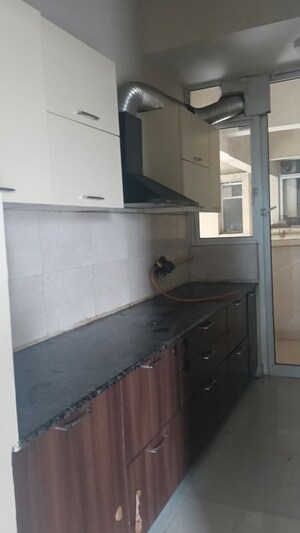 Kitchen in 2.5 BHK Apartment at Mahagun Mirabella, Sector 79 – for Rent