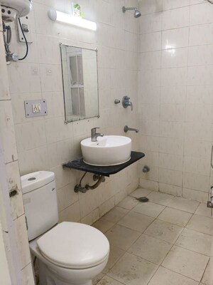 Bathroom in 2 BHK Apartment at Vasant Kunj – for Sale