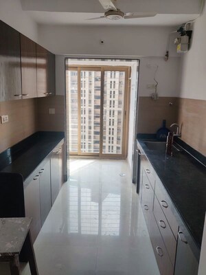 Kitchen in 2 BHK Apartment at Acme Ozone, Manpada – for Rent
