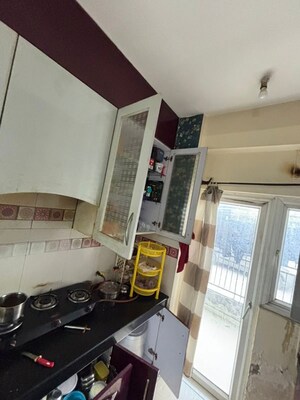 Kitchen in 2.5 BHK Apartment at Homes 121, Sector 121 – for Rent