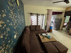 Living Room in 2.5 BHK Apartment at Homes 121, Sector 121 – for Rent