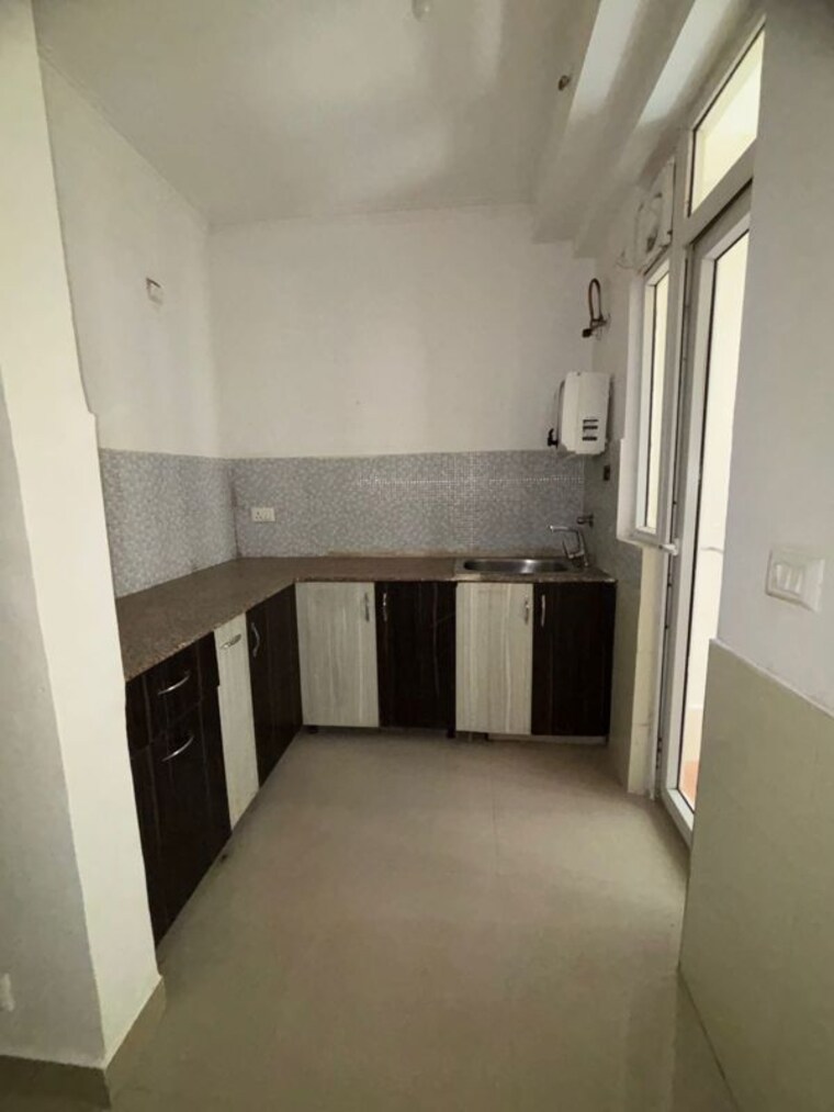 Kitchen, spring-meadows 2.5 Bedroom 1285 Sq.Ft. Apartment In Tech Zone 4 Greater Noida Greater Noida 10231260