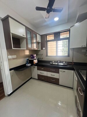 Kitchen in 2 BHK Apartment at Hiranandani Estate Queens, Ghodbunder Road – for Rent