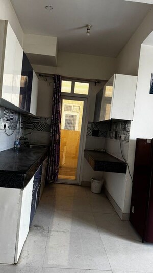 Kitchen in 2 BHK Apartment at Signature The Serenas, Sohna Sector 36 – for Rent