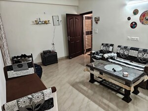 Living Room in 2 BHK Apartment at JKG Palm Court, Sector 16c Greater Noida – for Sale