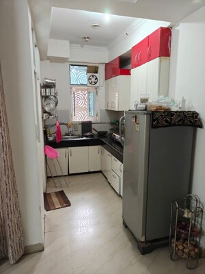 Kitchen in 2 BHK Apartment at JKG Palm Court, Sector 16c Greater Noida – for Sale