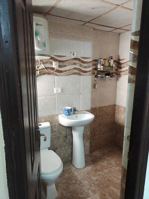Bathroom in 2 BHK Apartment at JKG Palm Court, Sector 16c Greater Noida – for Sale